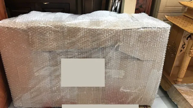 A flat item protected with bubble wrap and its label concealed