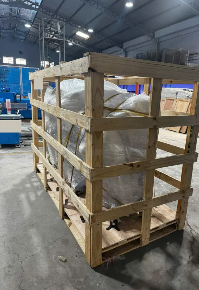Bubble-wrapped machinery inside a timber frame